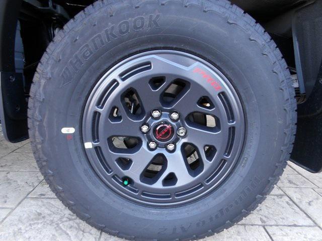 Photo of 2026 Boulder Gray Pearl Nissan Frontier