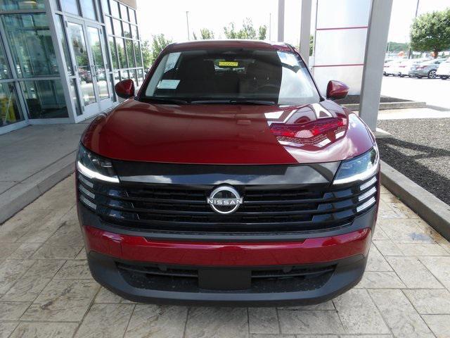 Photo of 2025 Scarlet Ember Tintcoat Nissan Kicks