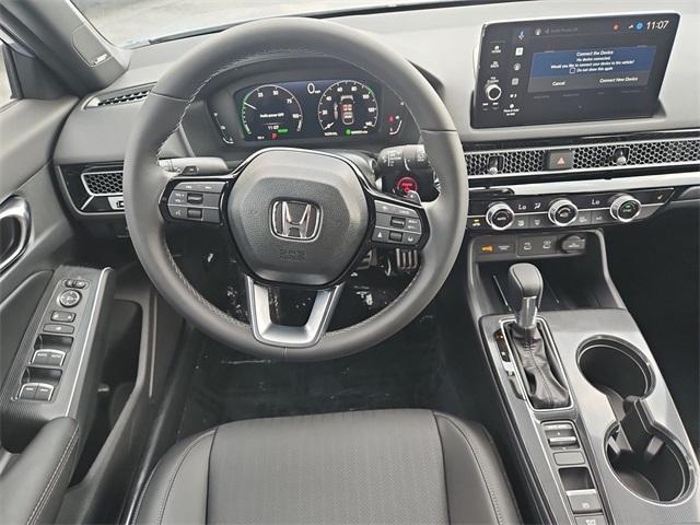 Photo of 2025 Sonic Gray Pearl Honda Civic Hybrid