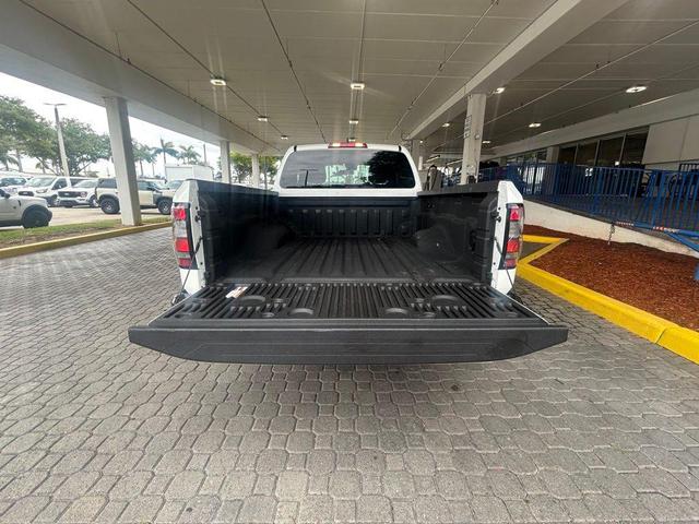 Photo of 2024 Glacier White Nissan Frontier