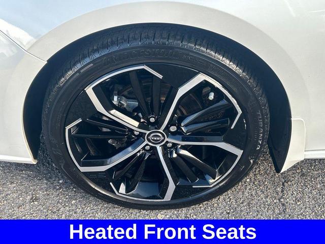 Photo of 2023 Pearl White Tricoat Nissan Altima