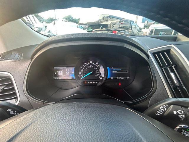 Photo of 2024 Black Metallic Ford Edge
