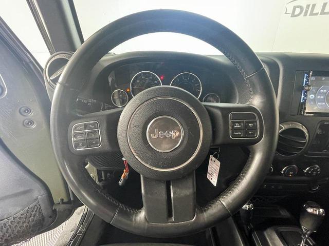 Photo of 2016 Tank Clearcoat Jeep Wrangler Unlimited
