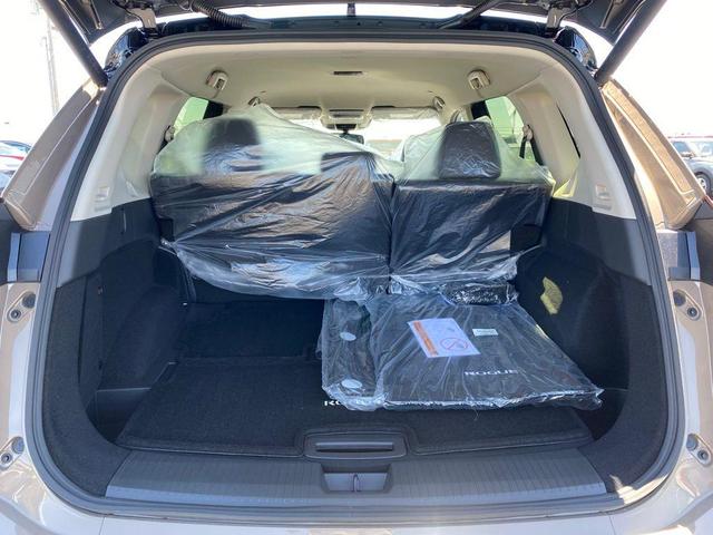 Photo of 2025 2t Dk Beige Blk Nissan Rogue