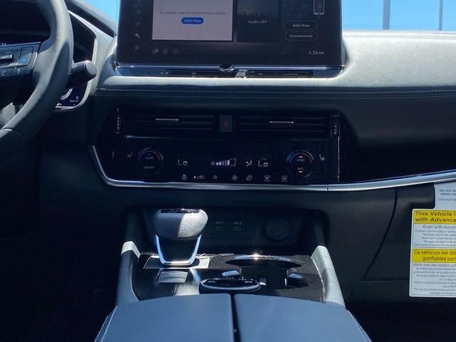 Photo of 2025 2t Dk Beige Blk Nissan Rogue