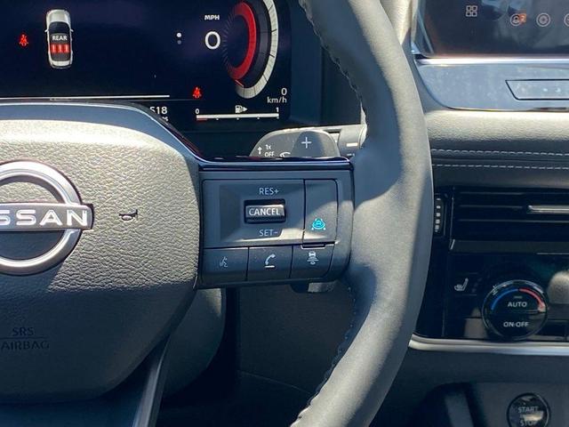 Photo of 2025 2t Dk Beige Blk Nissan Rogue
