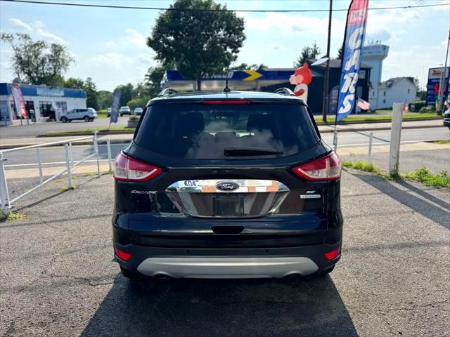 Photo of 2015 Tuxedo Black Ford Escape