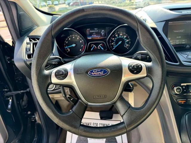 Photo of 2015 Tuxedo Black Ford Escape