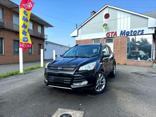 Photo of 2015 Tuxedo Black Ford Escape