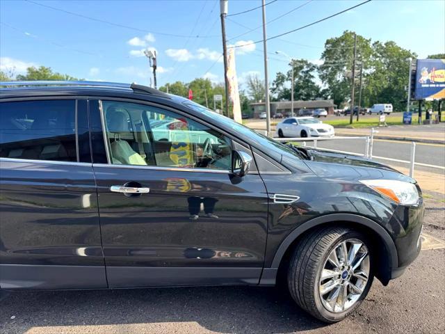 Photo of 2015 Tuxedo Black Ford Escape