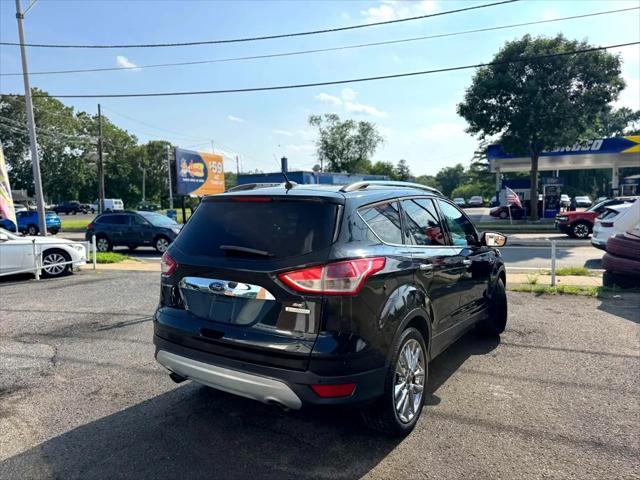 Photo of 2015 Tuxedo Black Ford Escape