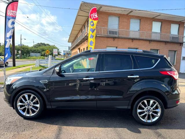 Photo of 2015 Tuxedo Black Ford Escape