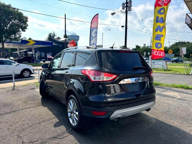 Photo of 2015 Tuxedo Black Ford Escape