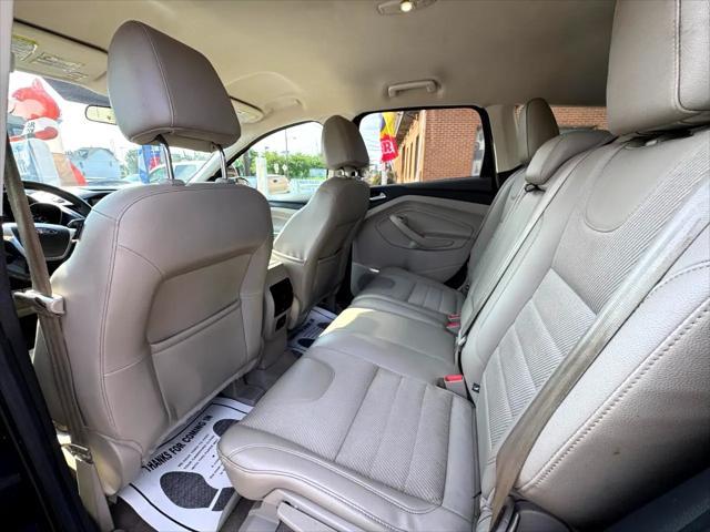 Photo of 2015 Tuxedo Black Ford Escape