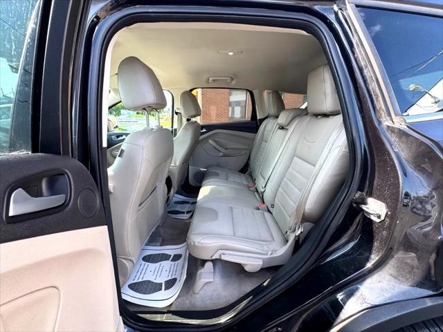 Photo of 2015 Tuxedo Black Ford Escape