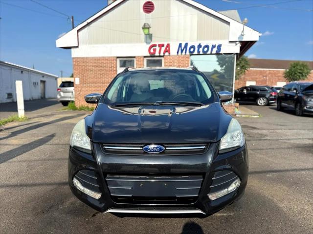 Photo of 2015 Tuxedo Black Ford Escape