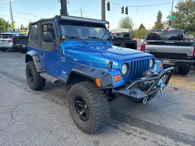 Photo of 2003 Blue Jeep Wrangler