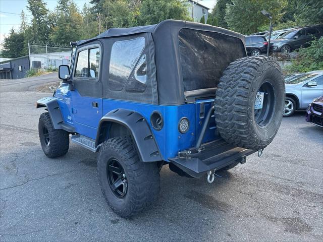 Photo of 2003 Blue Jeep Wrangler
