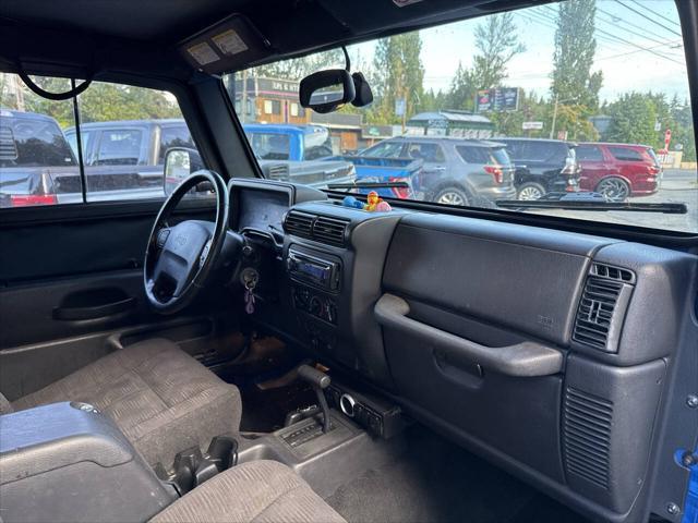 Photo of 2003 Blue Jeep Wrangler