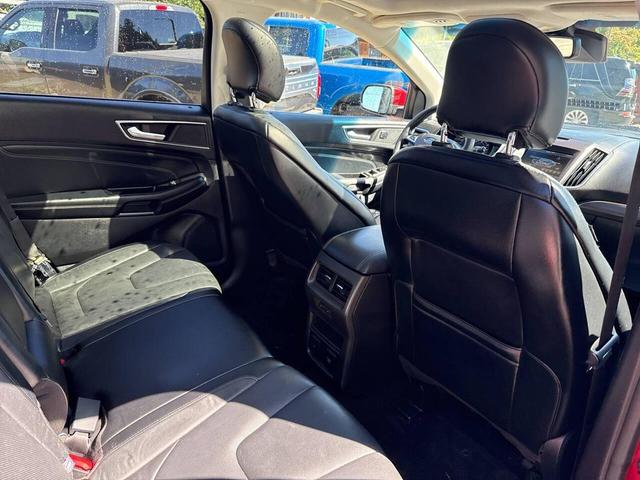 Photo of 2015 Ruby Red Metallic Tinted Clearcoat Ford Edge