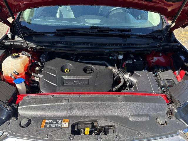 Photo of 2015 Ruby Red Metallic Tinted Clearcoat Ford Edge