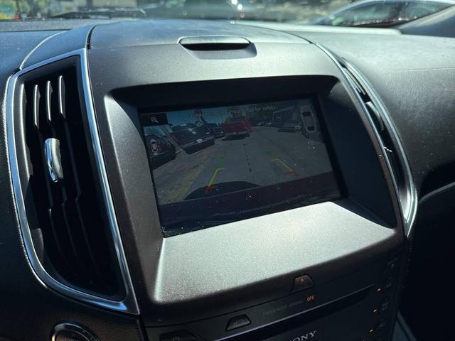 Photo of 2015 Ruby Red Metallic Tinted Clearcoat Ford Edge