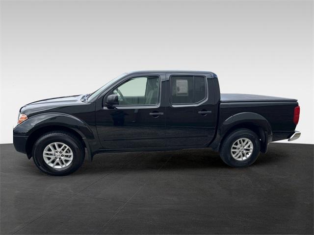 Photo of 2021 Magnetic Black Pearl Nissan Frontier