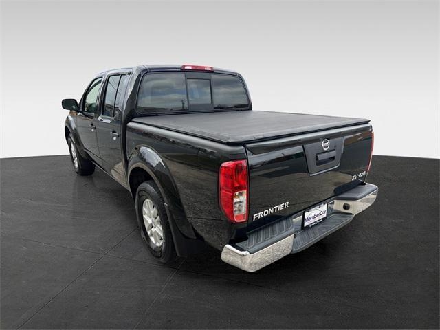 Photo of 2021 Magnetic Black Pearl Nissan Frontier