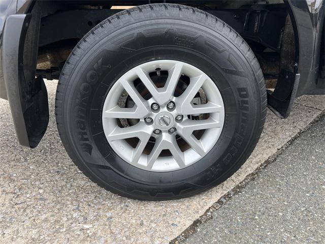 Photo of 2021 Magnetic Black Pearl Nissan Frontier