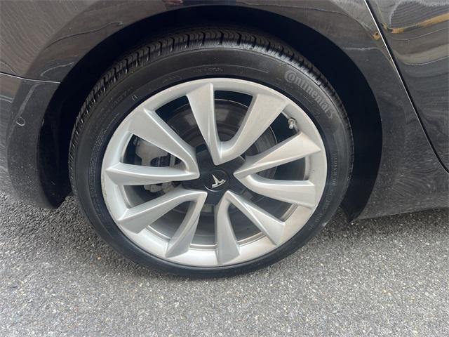 Photo of 2018 Black Tesla Model 3