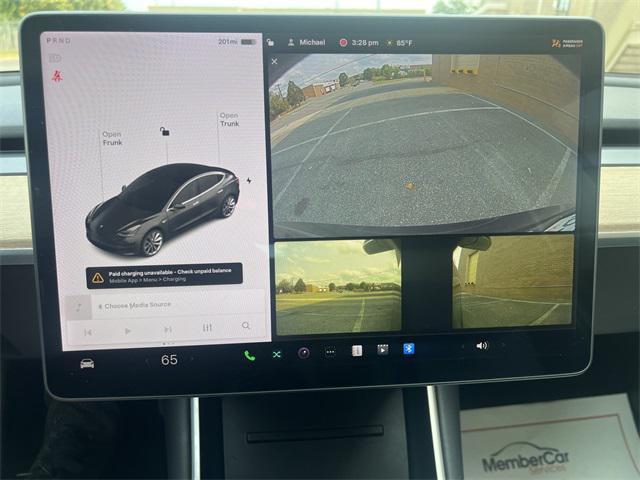 Photo of 2018 Black Tesla Model 3