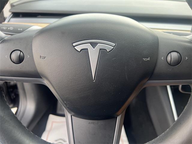 Photo of 2018 Black Tesla Model 3