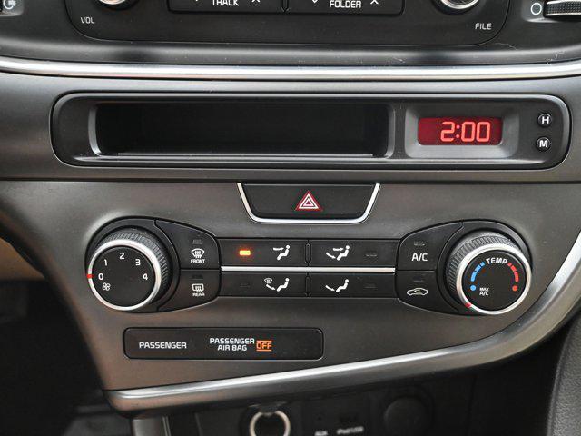 Photo of 2014 Remington Red Metallic Kia Optima