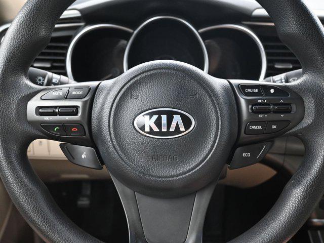 Photo of 2014 Remington Red Metallic Kia Optima
