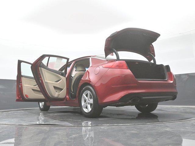 Photo of 2014 Remington Red Metallic Kia Optima