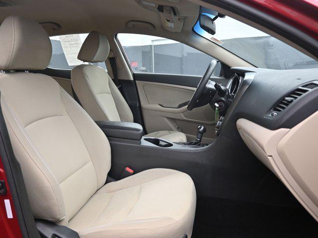 Photo of 2014 Remington Red Metallic Kia Optima