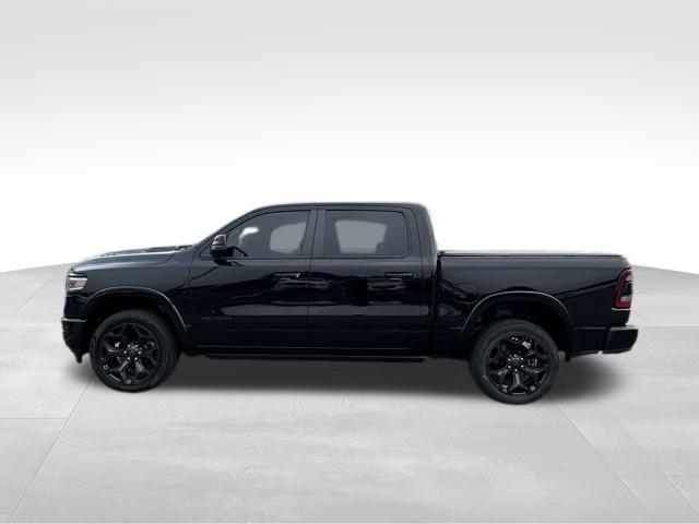 Photo of 2023 Diamond Black Crystal Pearlcoat RAM 1500