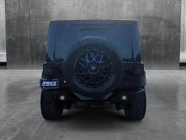 Photo of 2017 Black Clearcoat Jeep Wrangler Unlimited