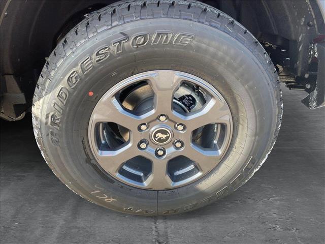 Photo of 2025 Ruby Red Metallic Tinted Clearcoat Ford Bronco