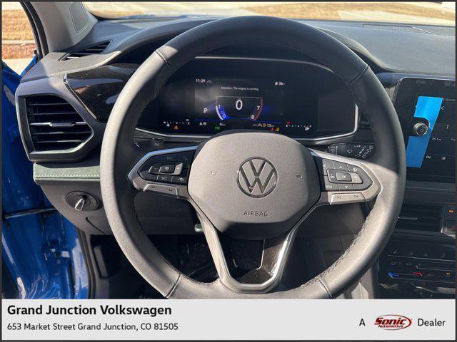 Photo of 2025 Cornflower Blue W/Black Roof Volkswagen Taos