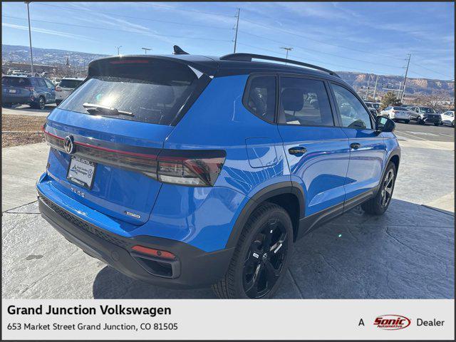 Photo of 2025 Cornflower Blue W/Black Roof Volkswagen Taos