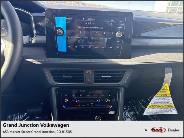 Photo of 2025 Cornflower Blue W/Black Roof Volkswagen Taos