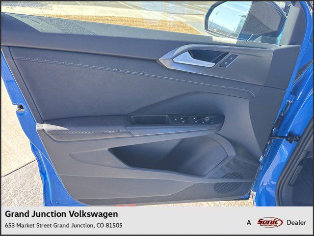 Photo of 2025 Cornflower Blue W/Black Roof Volkswagen Taos