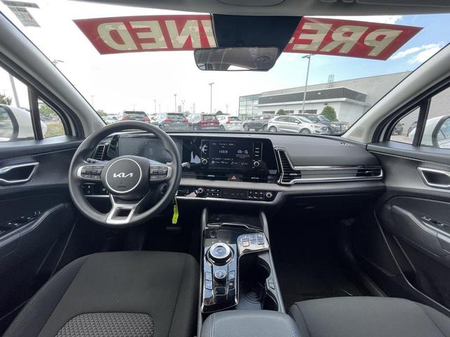 Photo of 2024 Snow White Pearl Kia Sportage Hybrid