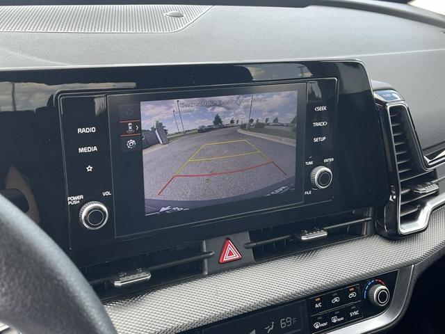 Photo of 2024 Snow White Pearl Kia Sportage Hybrid