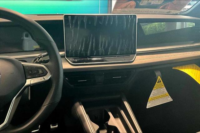 Photo of 2025 Avocado Green  W/Black Roof Volkswagen Tiguan