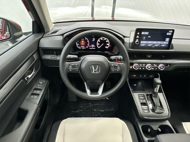 Photo of 2026 Radiant Red Metallic Honda CR-V