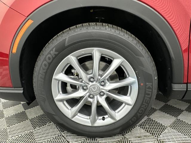 Photo of 2026 Radiant Red Metallic Honda CR-V
