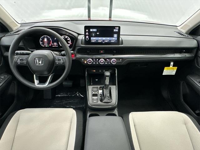 Photo of 2026 Radiant Red Metallic Honda CR-V