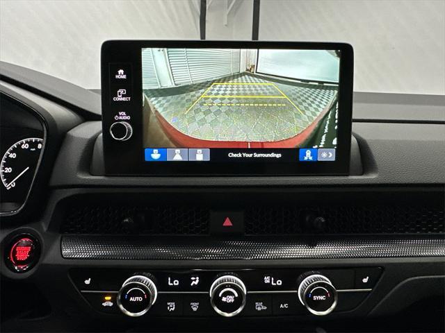 Photo of 2026 Radiant Red Metallic Honda CR-V